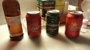 Image of three cans and a bottel of beer